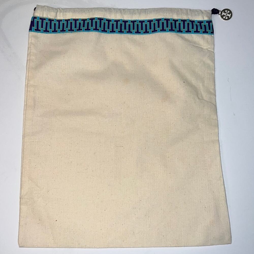 Tory Burch dust bag 12" x 15" off white with gold tone charm and blue edging